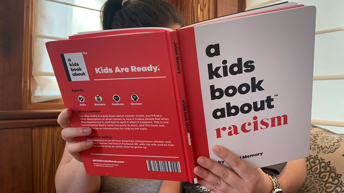 mom-and-son-reading-the-children's-book-called-A-Kids-Book-About-Racism